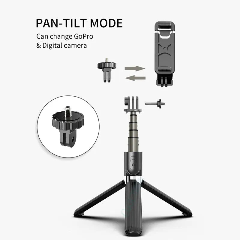 Black aluminium phone tripod selfie stick fully extended to 700mm next to an iPhone.