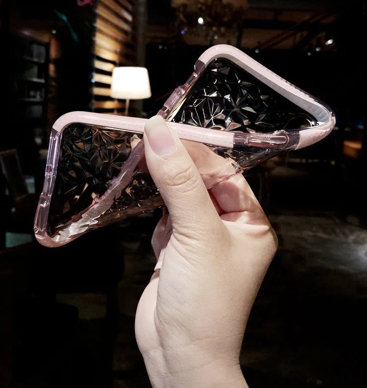 TPU mobile phone case with striped back design shown with pink, white, and black edge colour options for iPhone.