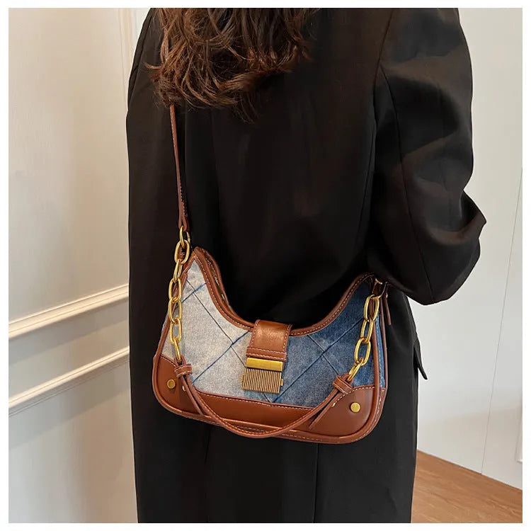 Brown denim women's shoulder bag with diamond mesh chain detail and bucket design
