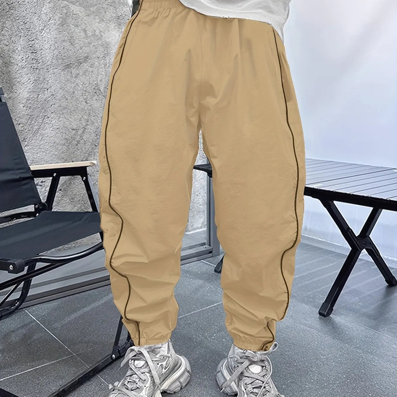 Men's loose fit casual sports trousers in bamboo fibre, shown in cropped length and a colour option like blue.