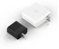 Black ZMI USB-C 65W GaN laptop power adapter showing compact size