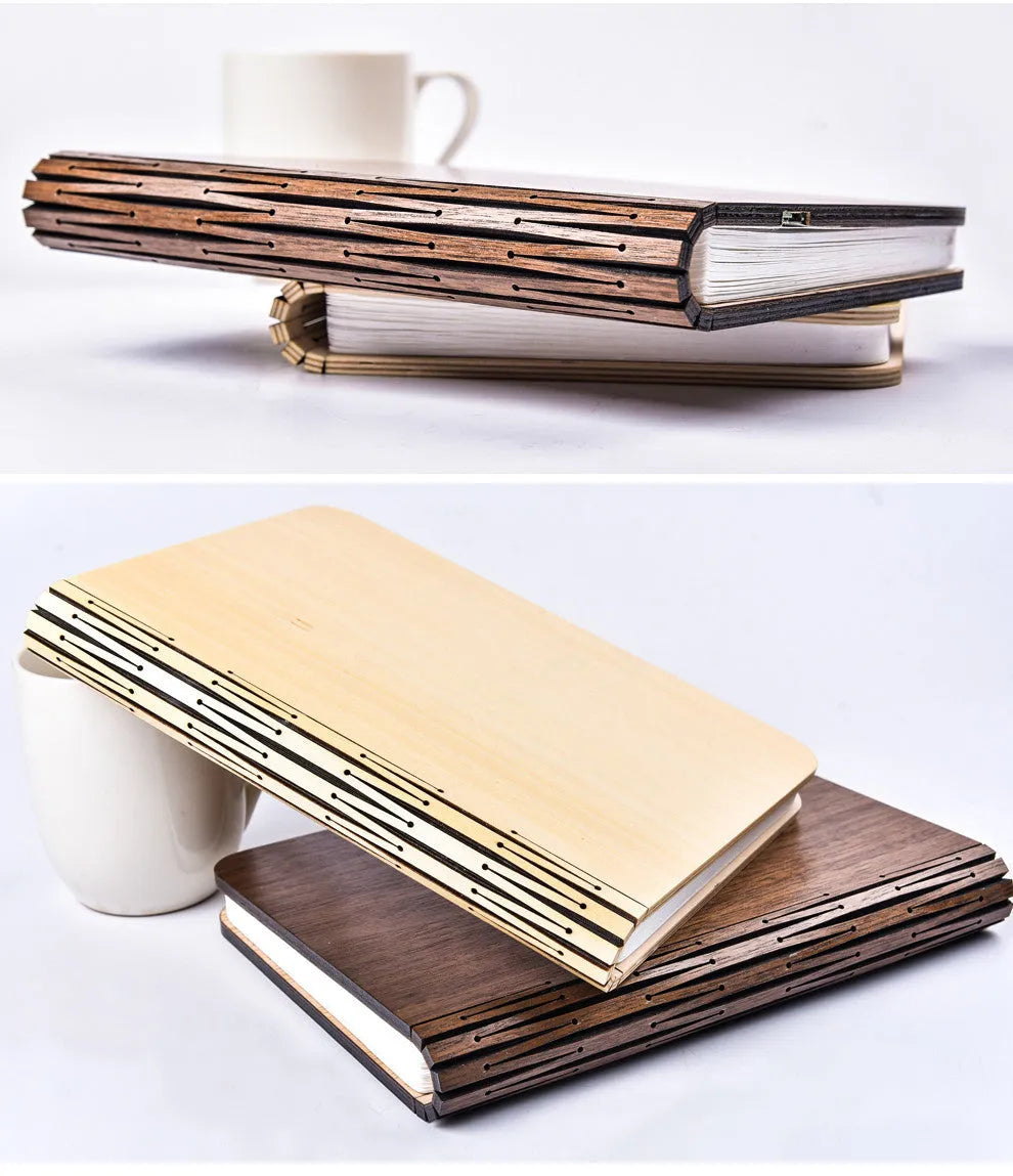 Walnut cover LED book light open at an angle showing white light pages on a surface