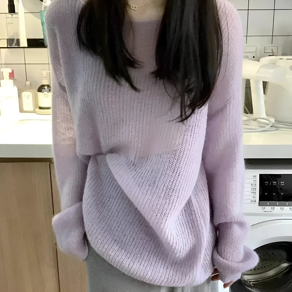 Purple sleeveless women's blouse with princess sleeves and a shoulder strap detail.