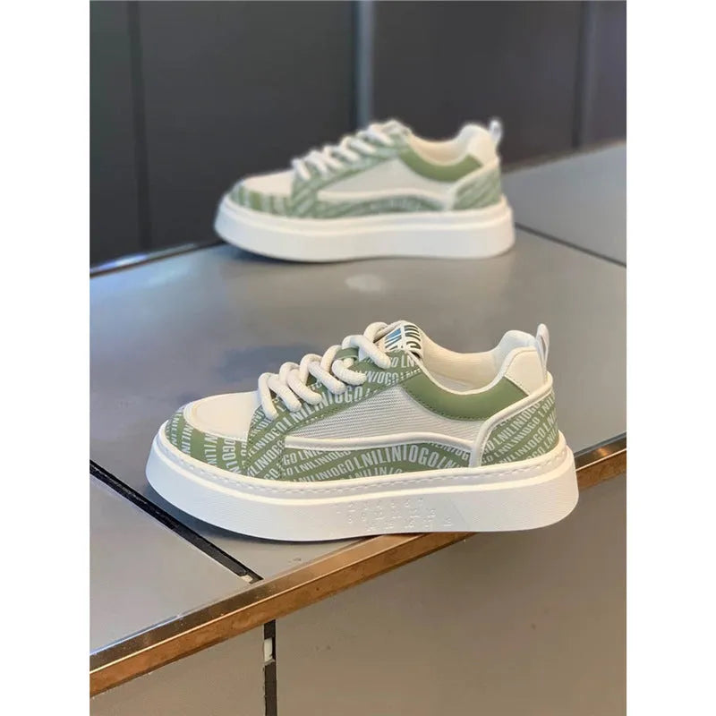 Men's white canvas board shoes with thick rubber sole and low heel, shown in white, black, grey, and green colour options.