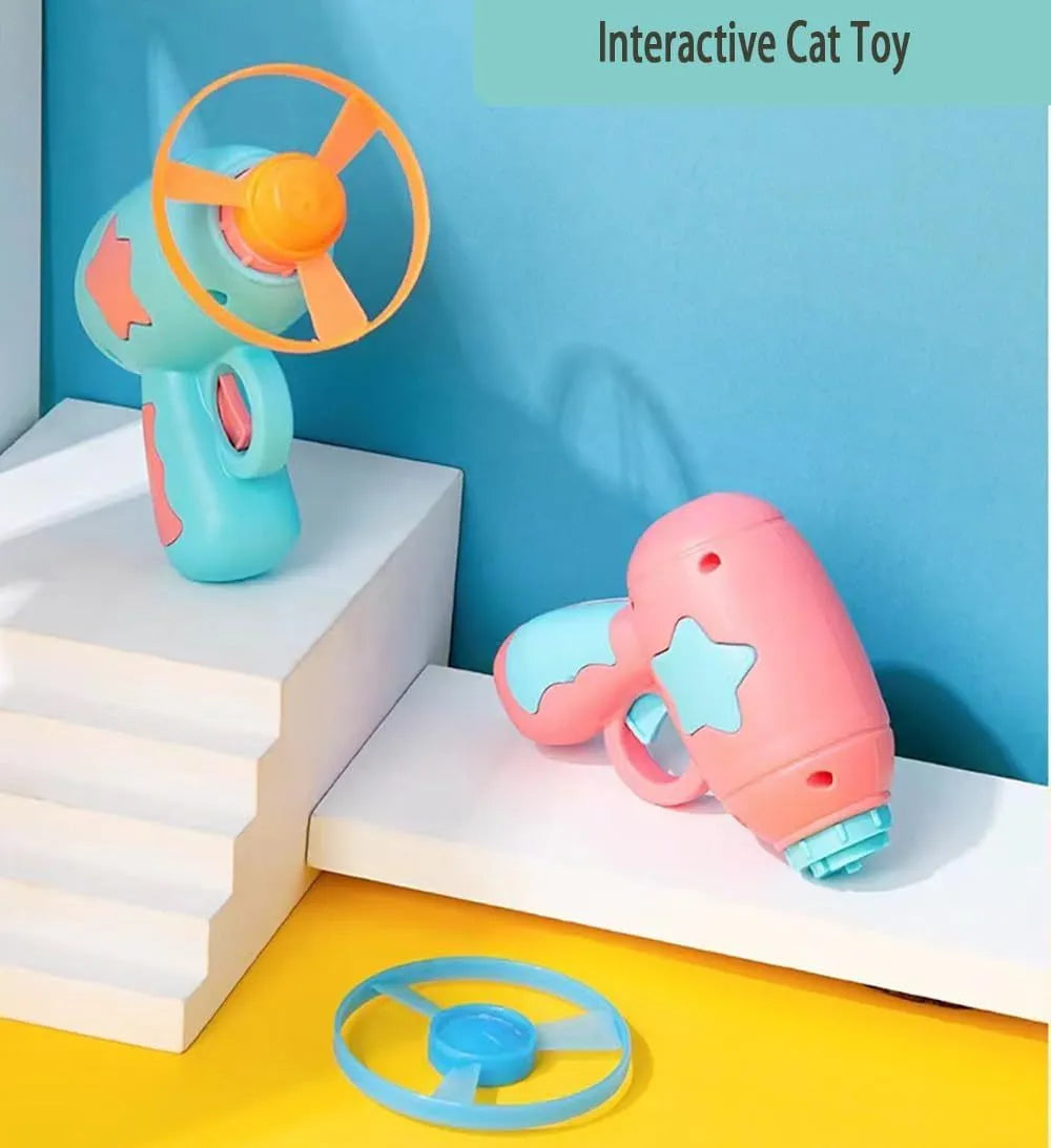 Blue interactive cat toy gun launching plastic frisbee for indoor feline play