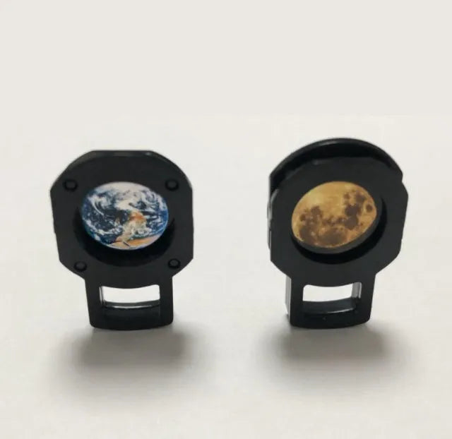 2 in 1 Earth and Moon star projector lamp with adjustable hose bracket on a table