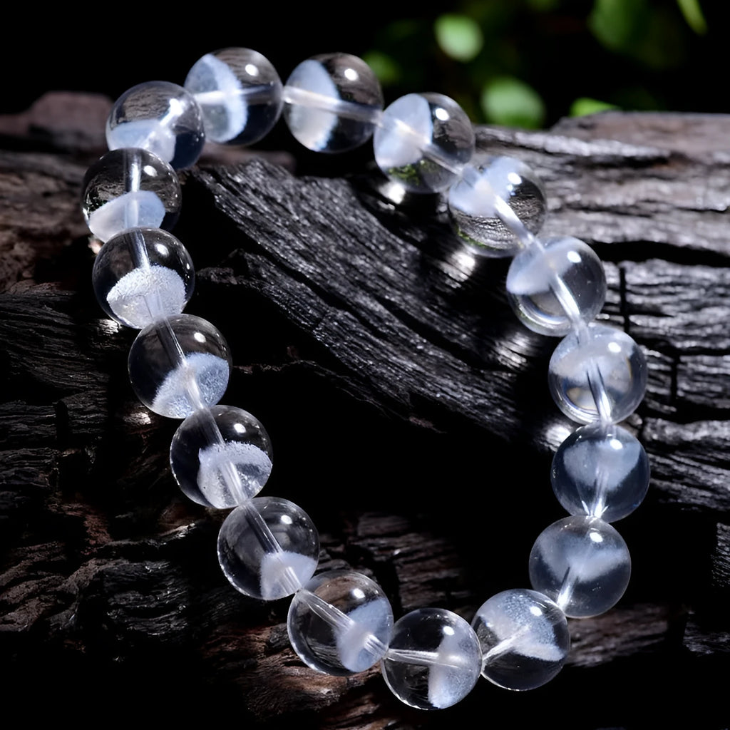 Women's white crystal ghost bracelet with a ruyi element, showing adjustable bead sizes.