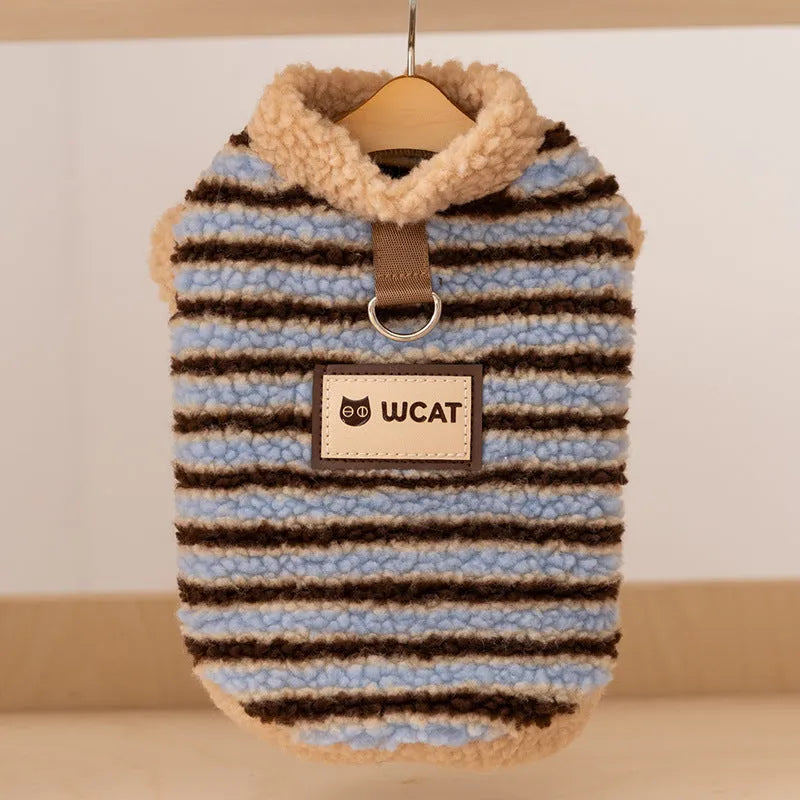 Yellow striped lambskin fleece dog clothing with bear patch and leash ring on a small dog