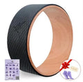 Green TPE and ABS yoga wheel measuring 33x33x13cm on a studio floor