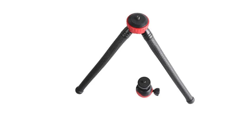 Black octopus tripod with flexible rubber legs wrapped around a pole holding a camera