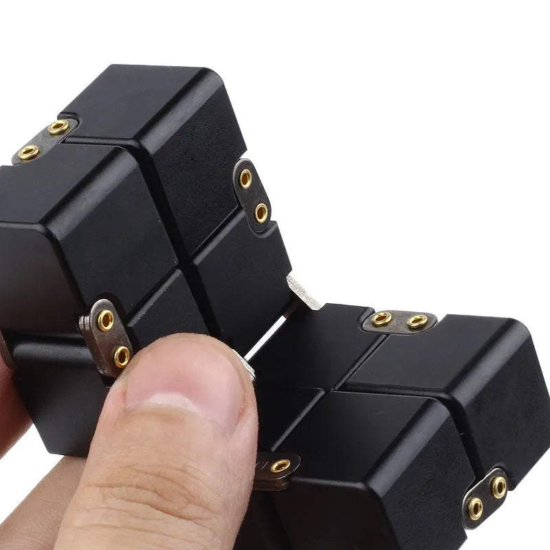 Zinc alloy infinity cube fidget toy showing rotating cube mechanism in metallic finish