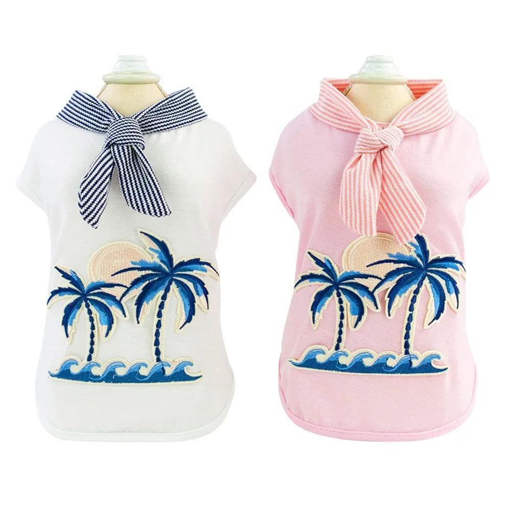 Pink cotton dog coat with coconut tree embroidery on a white background, size M shown
