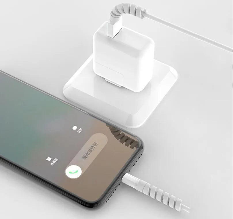 Plastic charging cable protector in various colours, showing its 3.5cm length.