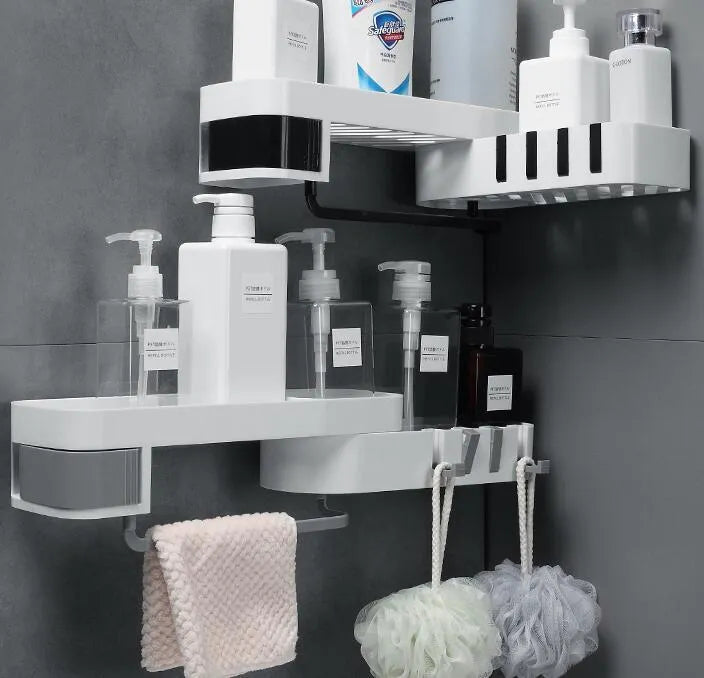 White and black retro European style corner shelf with suction mount on a bathroom wall.