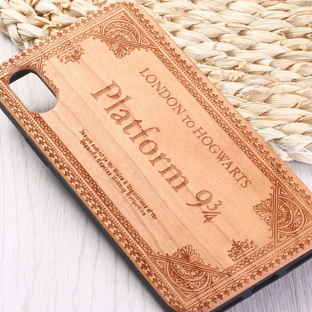 Wooden iPhone case with laser-carved cartoon animal design and TPU bumper in rosewood colour.