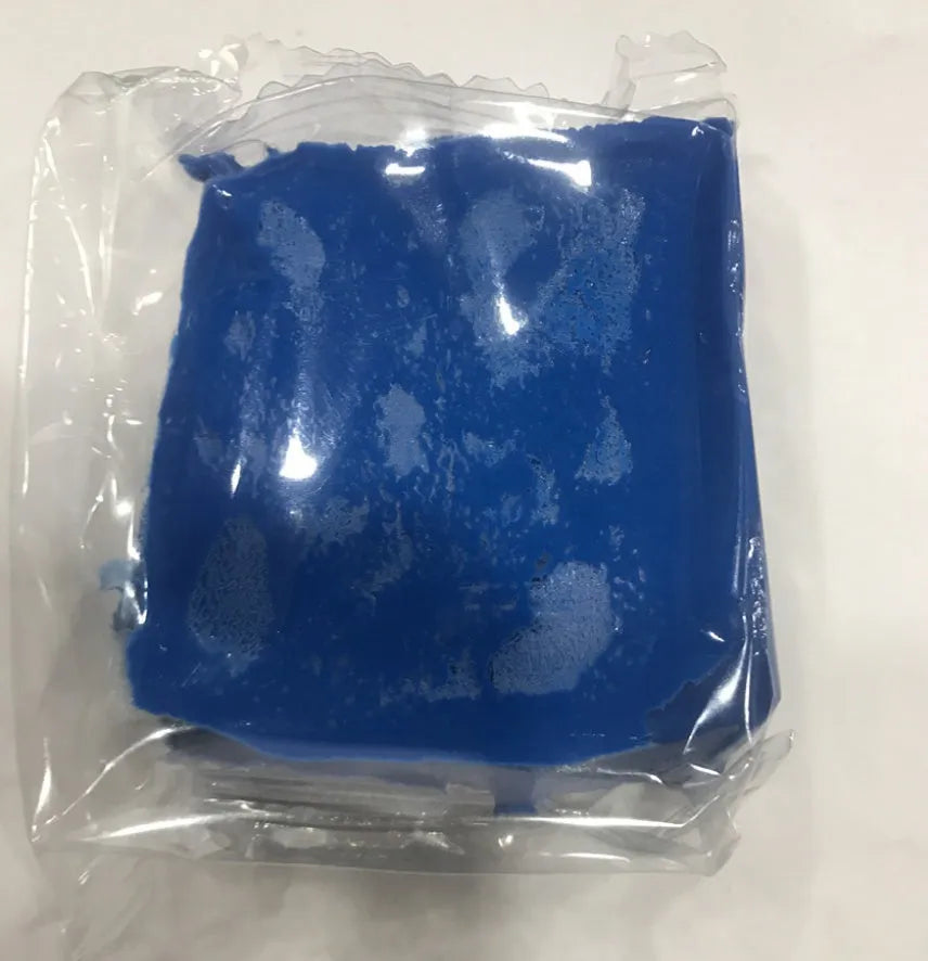 Dark blue Magic Clay car washing mud block with universal fit for paint decontamination