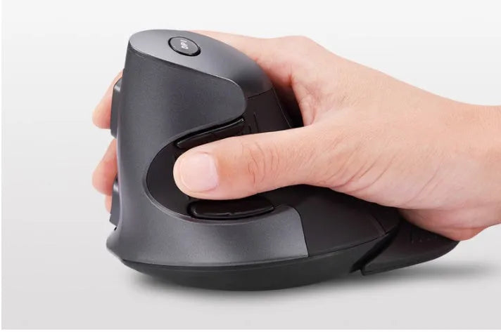 Black and white wireless vertical ergonomic mouse with USB receiver on a desk.