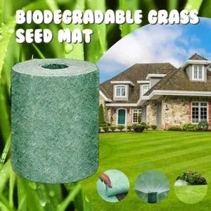 Biodegradable grass seed mat 20x300cm rolled out on bare soil showing wind proof and soil consolidation functions