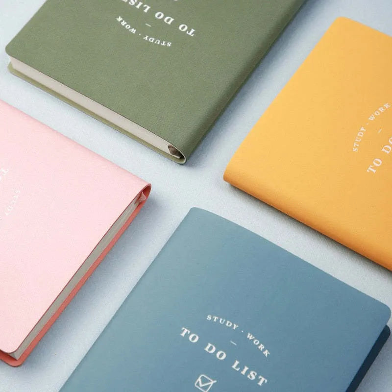 Portable todo list notebook with soft PU cover in four colour options showing compact 98x178mm size