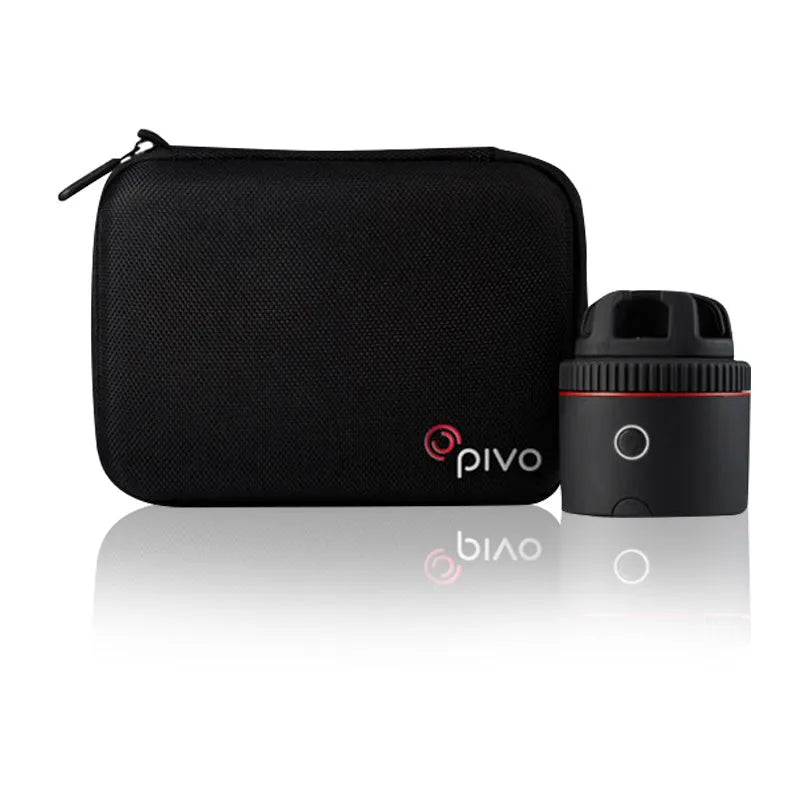 Matte black PIVO face tracking camera mounted on a surface with a smartphone attached.