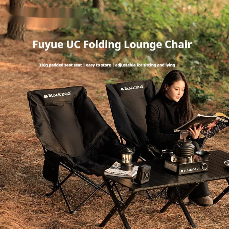 Night black portable folding camping recliner chair with a thickened seat in a moon chair style.
