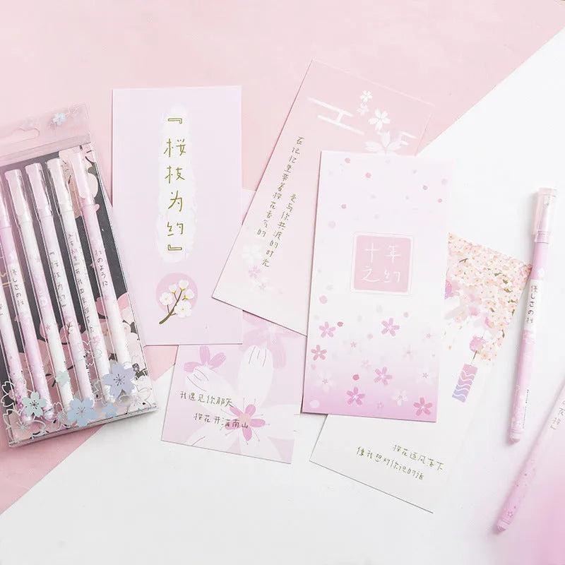 Six black Creative Sakura gel pens with 0.5mm needle tube refills arranged together