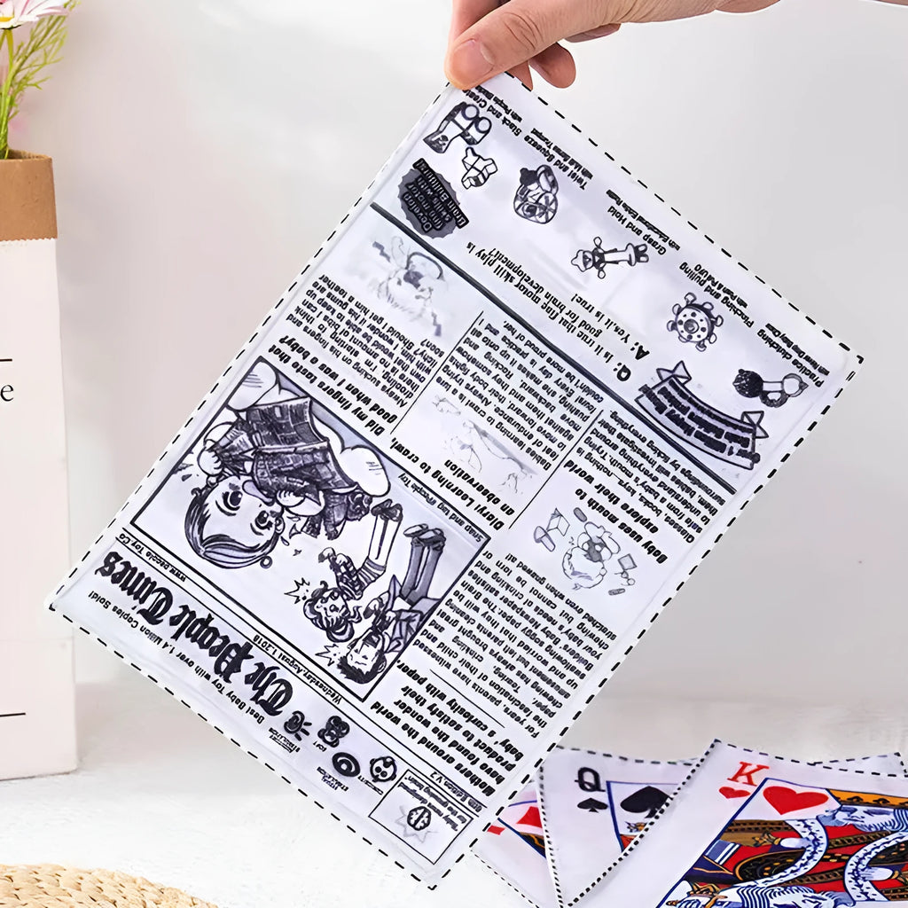 Tear-resistant dog toy with newspaper and playing card prints featuring a squeaker inside