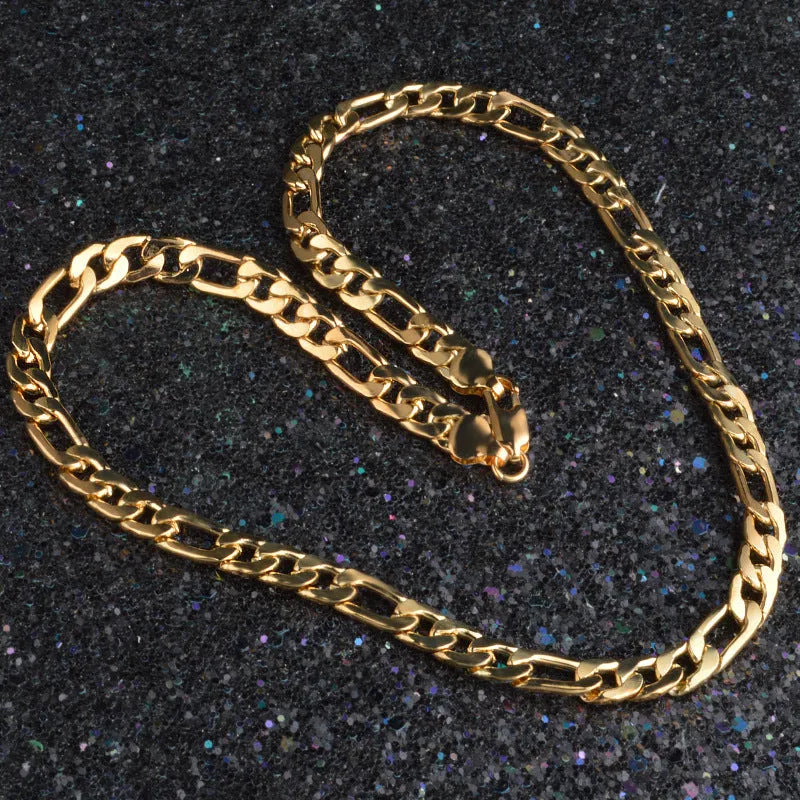 8mm solid silver curb link necklace with 18k gold finish on white background