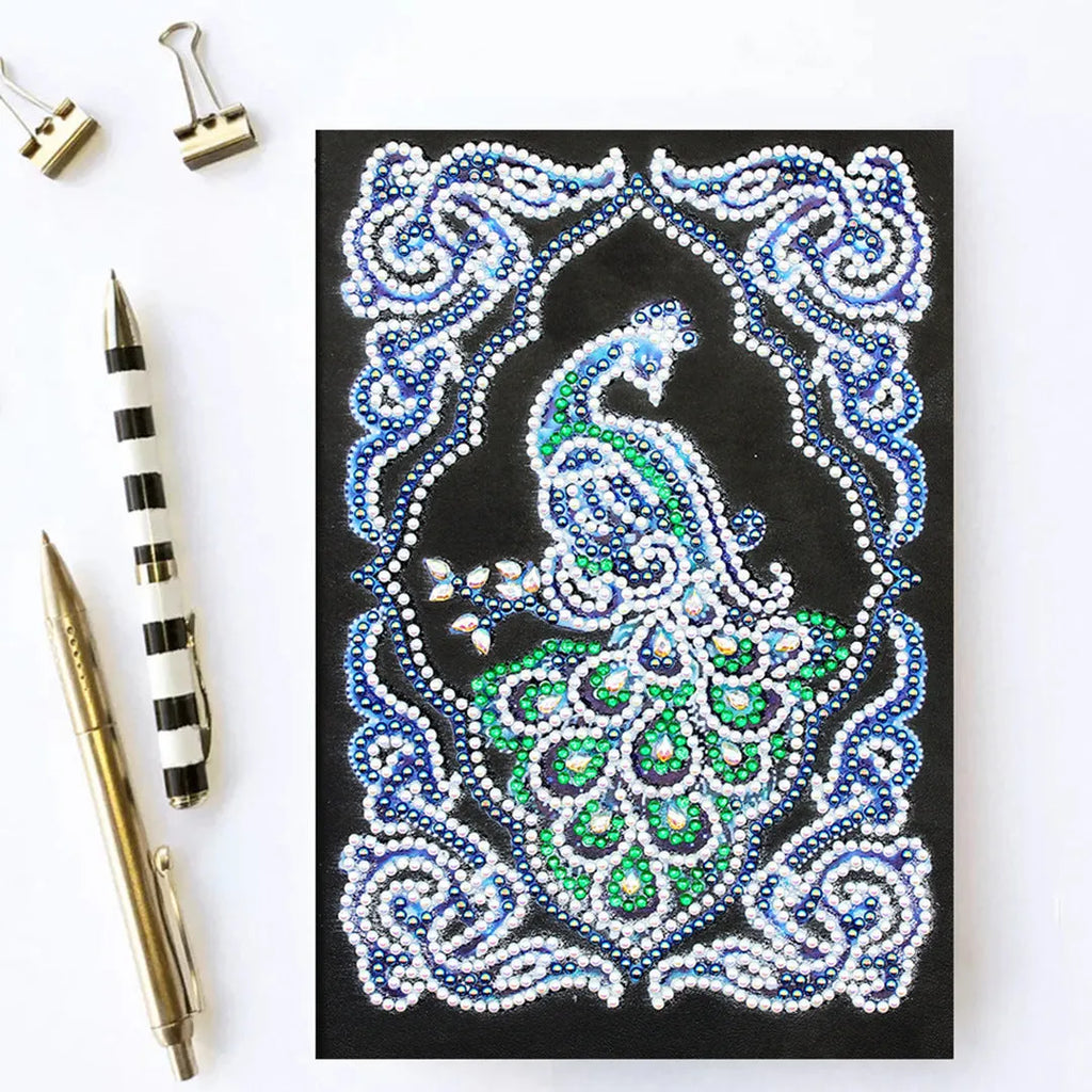 Black A5 diamond painting notebook with a peacock design, shaped drills, and OPP packaging.