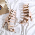 Women's high tube belt buckle high heel sandals in black with Roman boot style and ankle strap