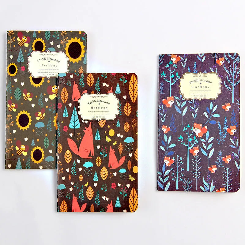 A5 kraft paper notebook with a hand-stitched binding and a hanging tassel bookmark in a natural design.