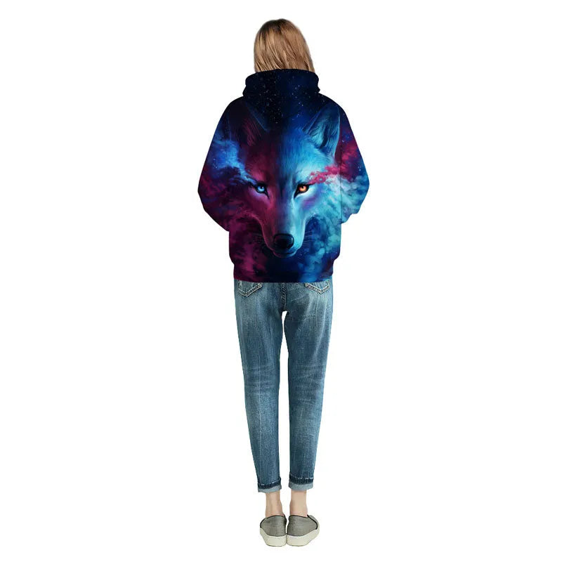 Men and women wearing a galaxy wolf print sweatshirt, long sleeve unisex pullover in black with starry space design