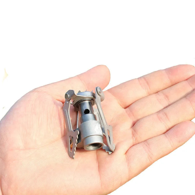 Portable propane gas camping stove with one-piece furnace structure