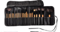 24 professional makeup brushes with wooden handles in a PU gift bag including eyebrow, powder and eyeshadow tools
