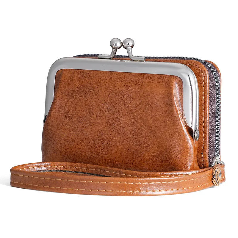 Ladies' 4-inch leather alternative coin purse with a metal clip buckle, shown in jujube red.