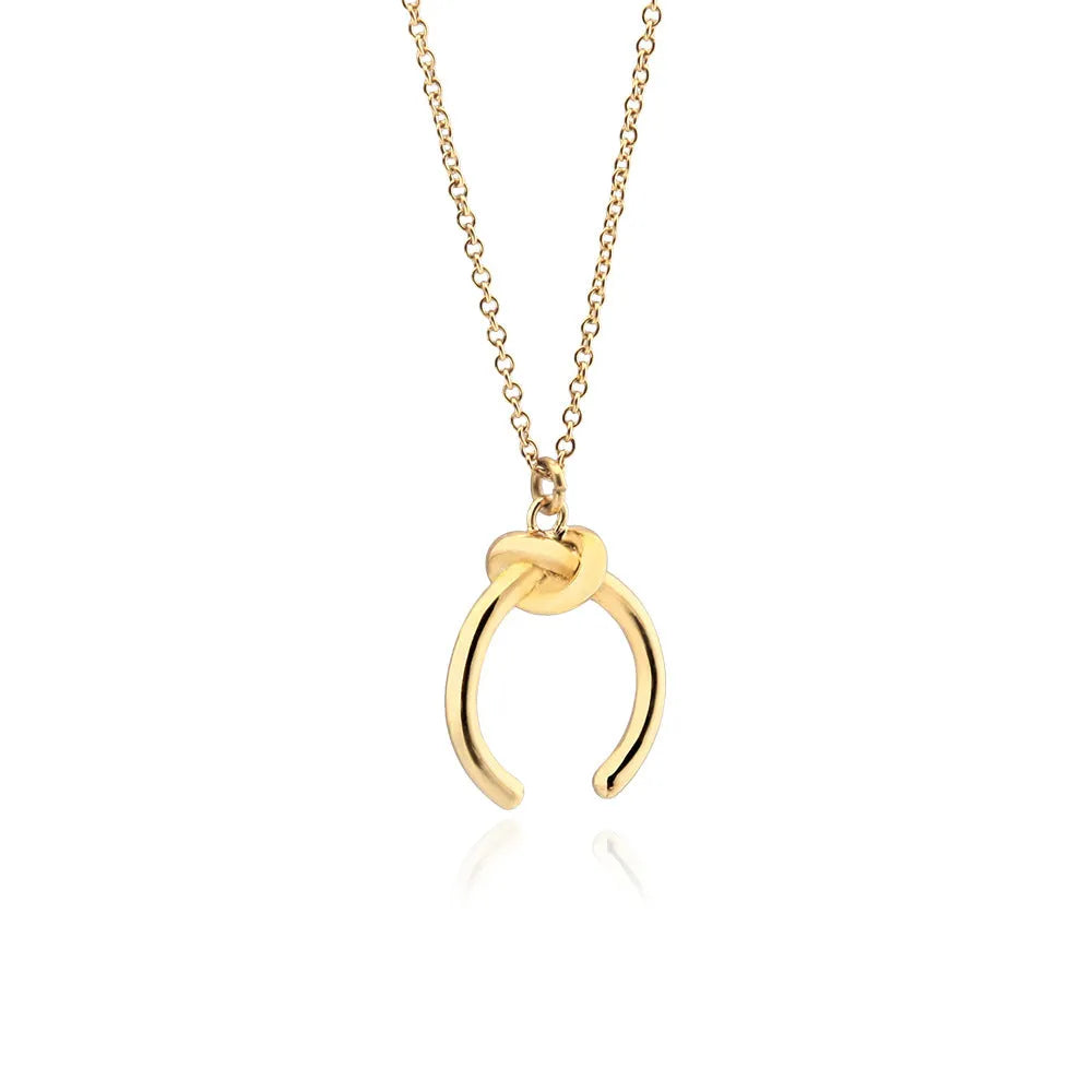 Copper geometric vintage pendant necklace with a cross chain in a gold electroplated finish.