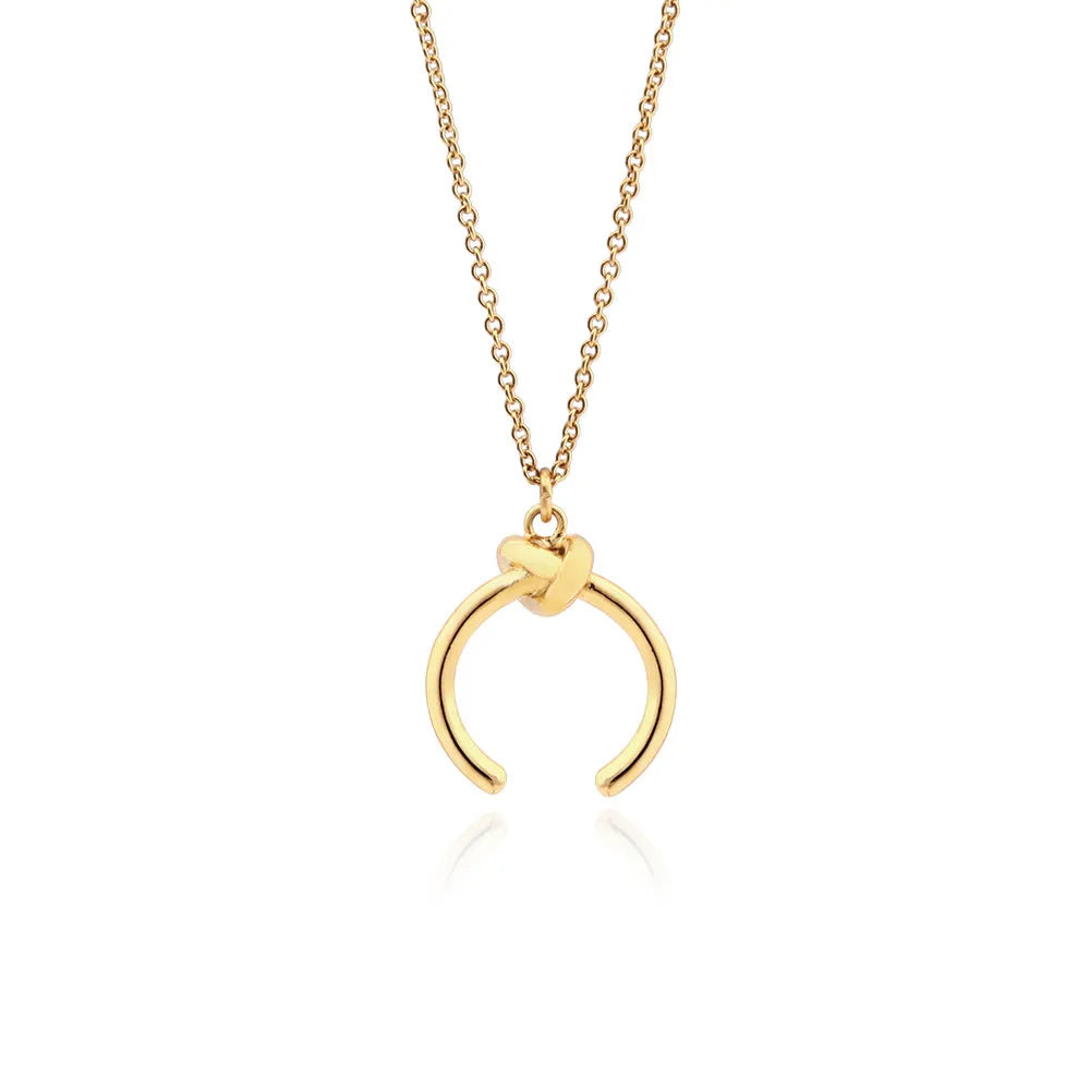 Copper geometric vintage pendant necklace with a cross chain in a gold electroplated finish.