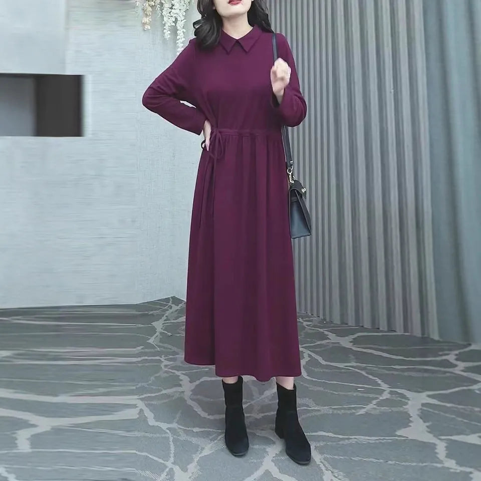 Purplish red plus size long sleeve dress with a long skirt for women.
