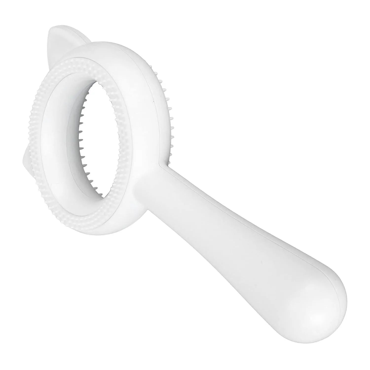 Blue and white double-sided pet grooming brush with ergonomic handle on a table