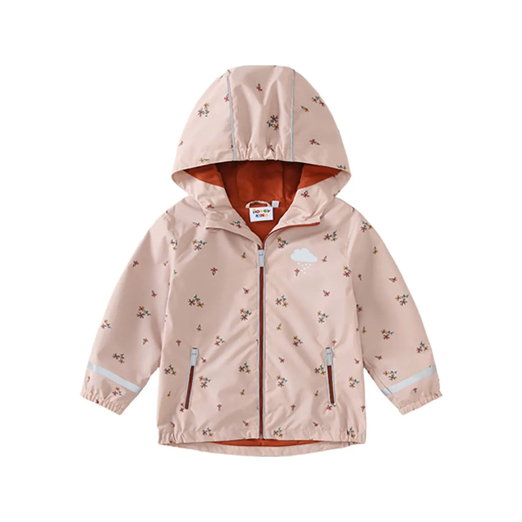 Pink floral children's rain jacket and pants set with hood, reflective details, and loose fit on a child outdoors
