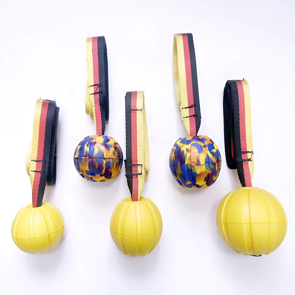 Floating camouflage and yellow EVA foam pet training balls with strings in three different sizes