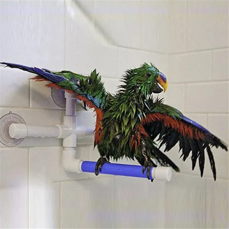White foldable plastic parrot bath shower stand with three suction cups on a shower wall