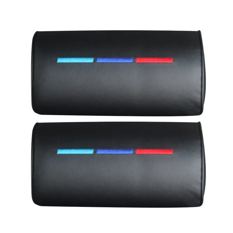 Black cotton car seat neck pillow for travel support on a car headrest