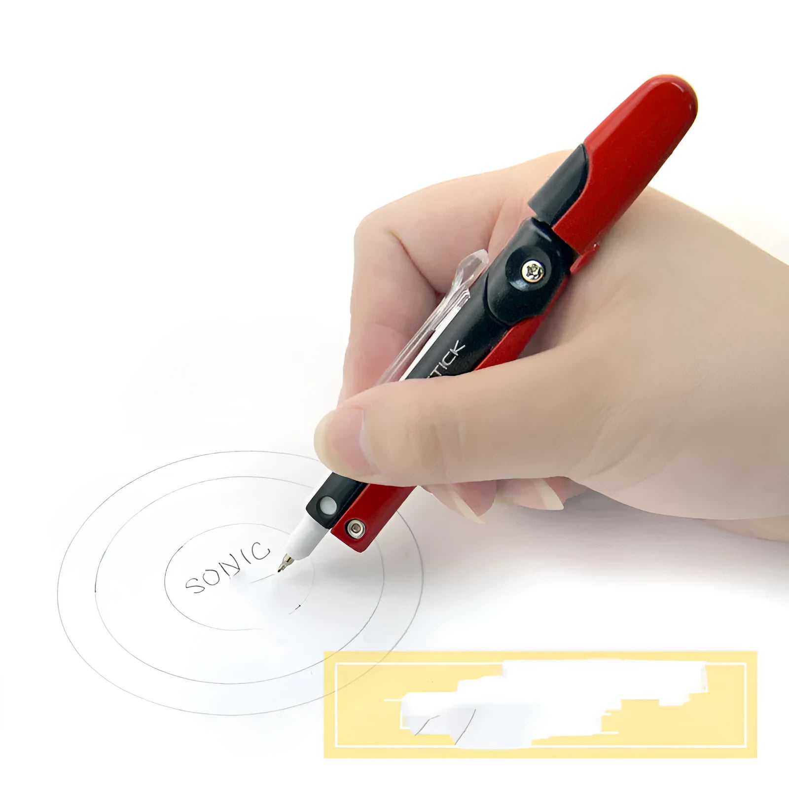 Blue automatic pencil compass with extended legs and protective safety cover next to a mechanical pencil tip.