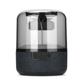 Black wireless Bluetooth speaker with touch controls and 360-degree sound projection