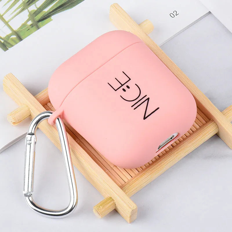 Black and Pink AirPods case covers with Flower, Love, and Smiley face emoji designs.