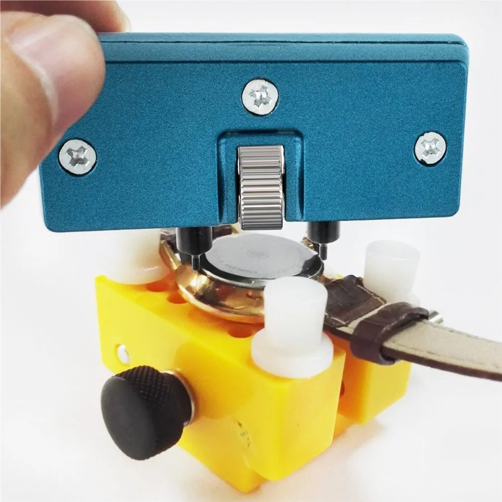 Yellow plastic watch fixing base and plastic case opener tool for watch repair.