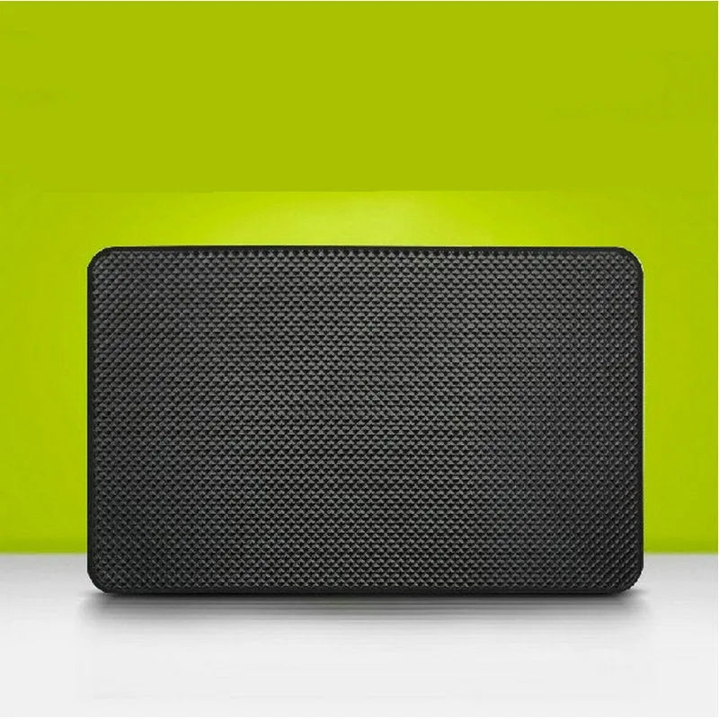 Small mesh non-slip car mat 18x13cm in grid colour on dashboard