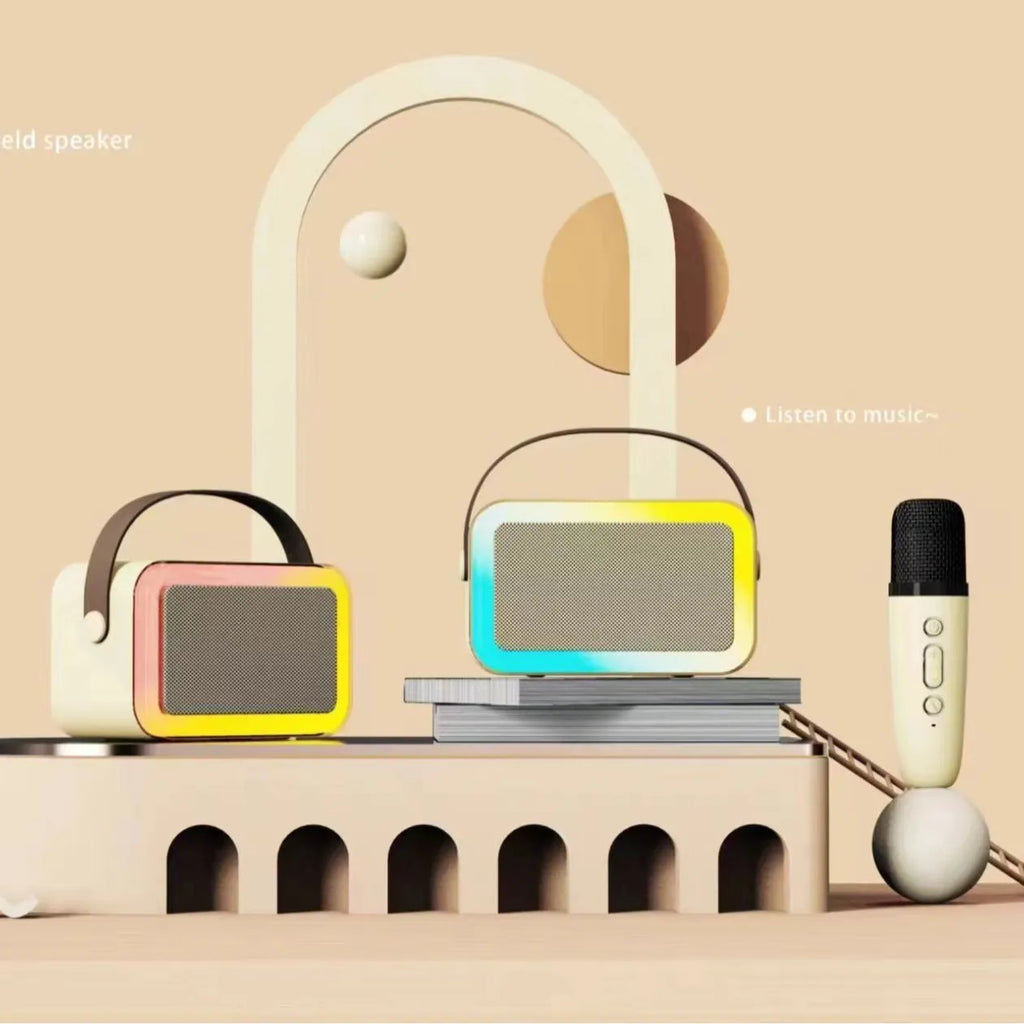 White portable Bluetooth karaoke speaker with coloured lights and a handheld microphone.