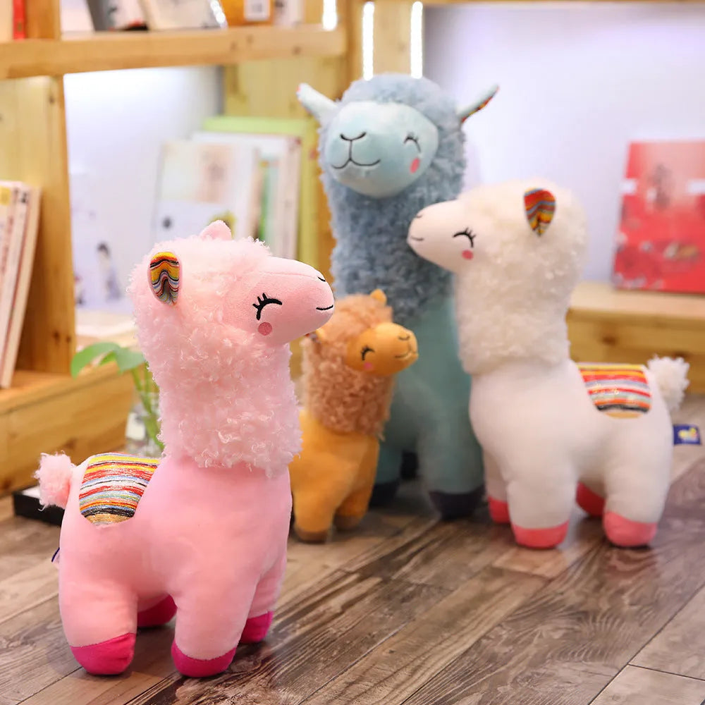 Alpaca llama plush toy in white standing on a surface